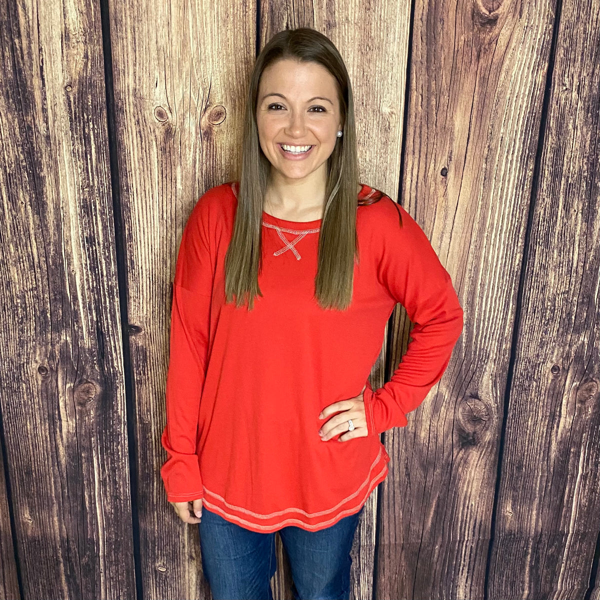 HONEYME RED LS TOP WITH EXPOSED STITCHING